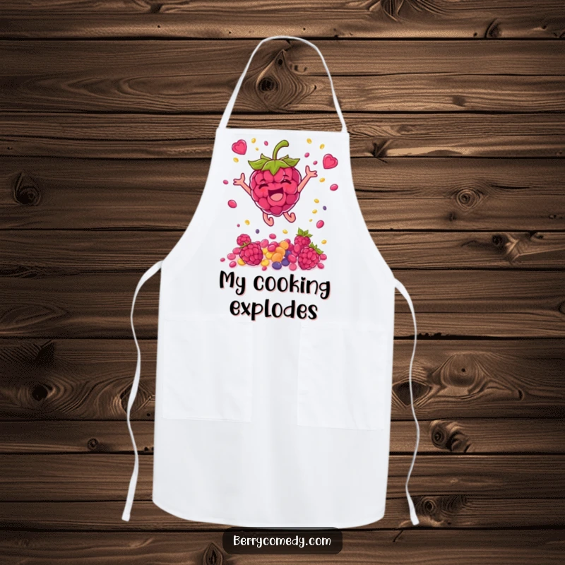 Funny apron showing a happy raspberry character leaping high and showering seeds, bringing vibrant fun to the kitchen.