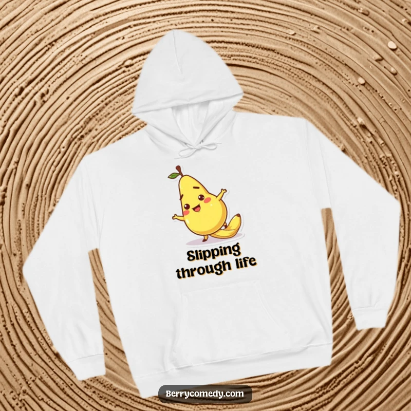 Funny hoodie featuring a pear character comically slipping on a banana peel, its cartoonish expression adding a touch of slapstick humor.