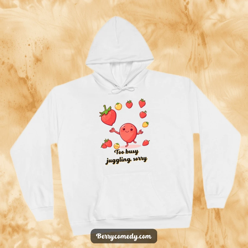 Funny hoodie depicting a cheerful strawberry juggling an assortment of tiny fruits, looking absolutely delighted and full of playful energy.