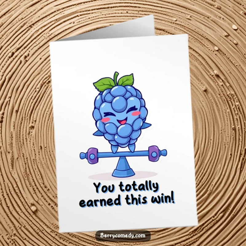 Funny Free Printable Congrats Card: Blue raspberry character winking and balancing on a teeter-totter, celebrating success.