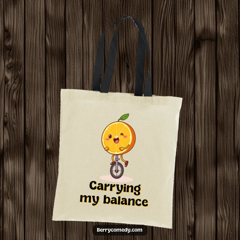 Funny tote bag with a happy orange slice, wobbly legs and all, attempting to ride a miniature unicycle, perfect for daily use.